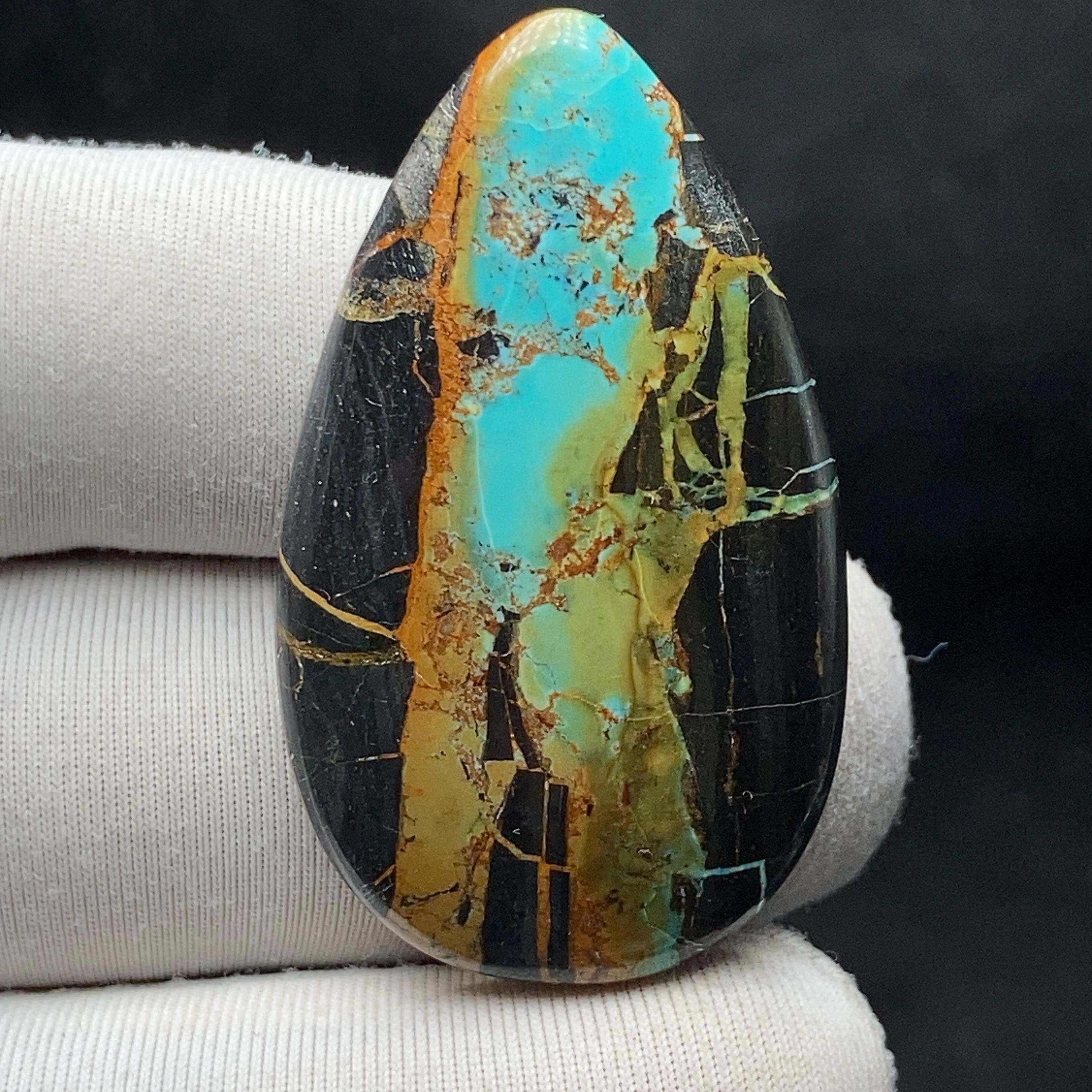 Black Jack Turquoise Cabochon | 38.1x22.2 MM 32.69 Carat | Showing