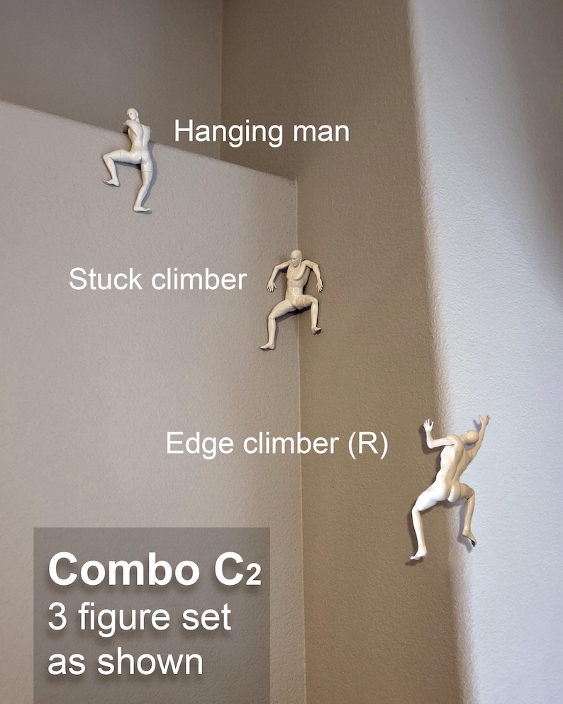May include: A set of three off-white wall-mounted figures labeled Hanging man, Stuck climber, and Edge climber (R). The text Combo C2 3 figure set as shown is displayed in a gray box. These figures are depicted in various climbing poses.