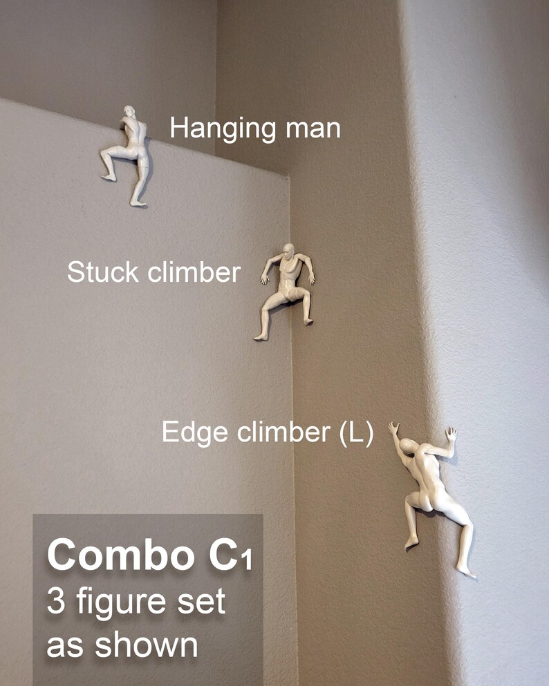May include: A set of three white wall-mounted figurines depicting climbing figures. The set includes a hanging man, a stuck climber, and an edge climber (L). The text on the image labels these as Combo C1 3 figure set as shown.