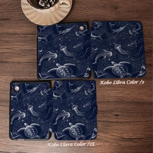 May include: Two dark blue e-reader cases featuring a white line art pattern of sea turtles, jellyfish, and whales against a starry background. The text Kobo Libra Color /2 and Kobo Clara Color /2E is printed near the respective device cases.