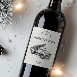 Feestwijnflesetiket, aangepast kerstwijnetiket voor een cadeau voor een wijnliefhebber. Digitaal afdrukbaar sjabloon voor bulkalcoholische kerstcadeaus.