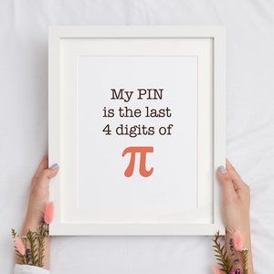 May include: White framed print with the text "My PIN is the last 4 digits of Pi" with a large orange Pi symbol.