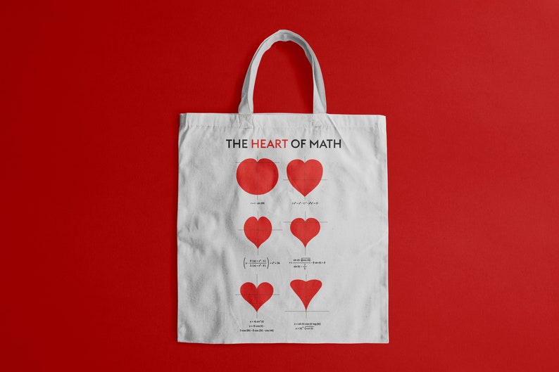May include: White canvas tote bag with the text "THE HEART OF MATH" printed in black. The bag features a series of red hearts with mathematical equations underneath each heart.