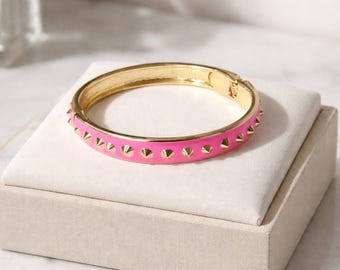 Felroze gouden armband met scharnier met spikes, nieuw!