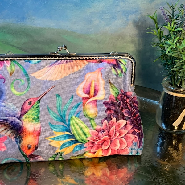 Beautiful Makeup Bag in a Vibrant Hummingbird and Floral Printed water resistant Fabric