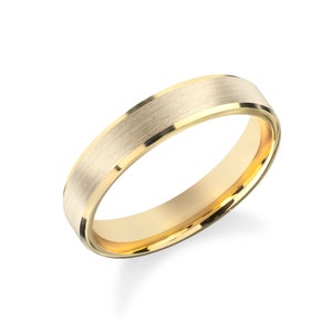 May include: A gold wedding band with a brushed finish and a polished edge.