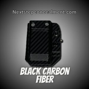 May include: Black carbon fiber holster with a screw and two rivets. NextStepConcealment.com