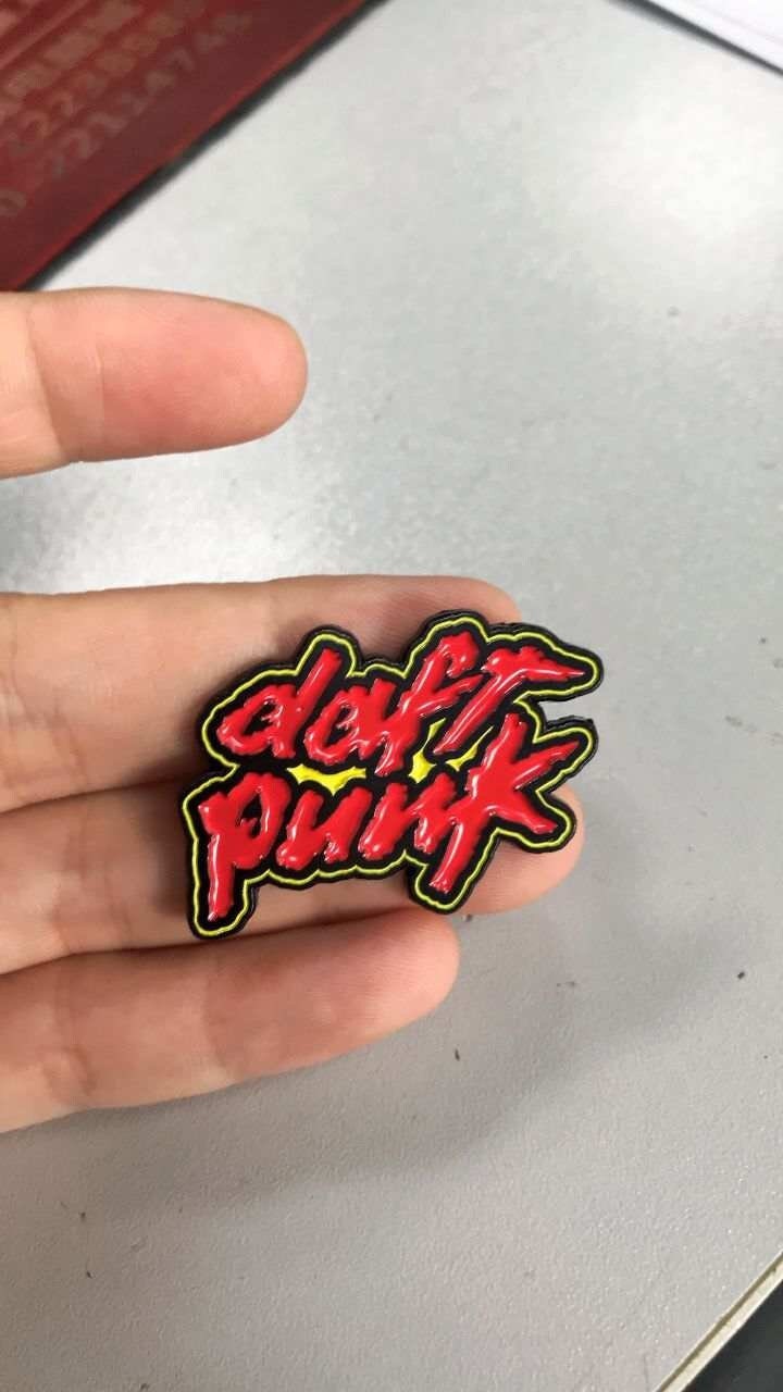My buddy made a set of helmet pins for every Daft Punk era! : r/DaftPunk