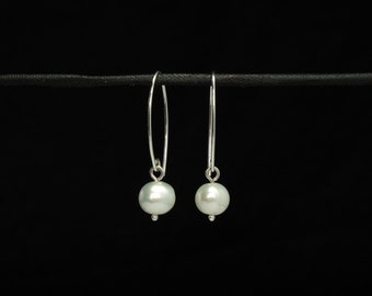 white pearl on modern hooks earrings