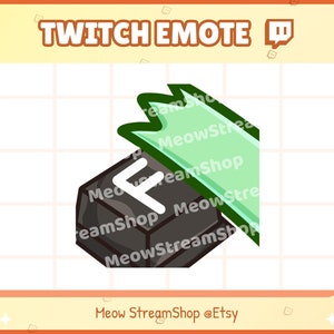May include: A black and white Twitch emote with the letter "F" on a gray, hexagonal button. A green, leafy banner with the text "MeowStreamShop" is above the button.