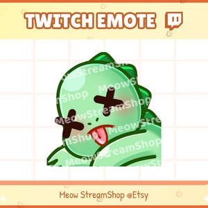 Pode incluir: Um dinossauro verde de desenho animado com a língua de fora e X nos olhos. O dinossauro está deitado de lado com a cabeça inclinada para trás. O texto "Meow StreamShop @Etsy" está abaixo do dinossauro.