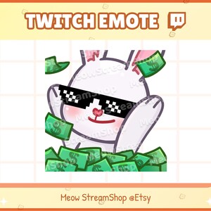 Peut inclure: Un lapin blanc portant des lunettes de soleil pixelisées est entouré de billets de dollar verts. Le lapin sourit et a les bras levés en l'air. Le texte "Twitch Emote 🪃" est en haut de l'image.