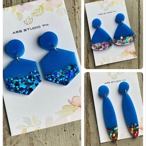 Handmade blue dangle geometric resin earrings, with glitter. Quirky, holiday, jewellery gift
