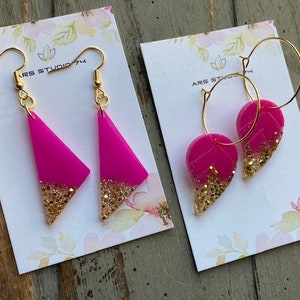 Handmade fuchsia and golden glitter dangle resin earrings, leaves or triangles. Quirky, summer, jewellery gift