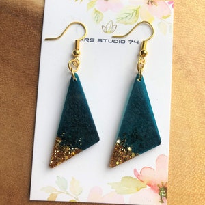 Handmade teal dangle triangle resin earrings with golden glitter. Gold plated ear hooks. Bespoke, unique, statement gift for her.