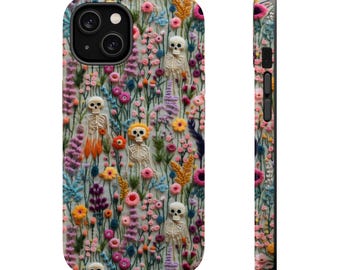 May include: A phone case with a floral pattern featuring skeletons embroidered in a field of flowers. The case is designed for an iPhone.