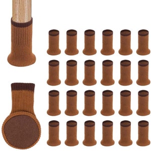 May include: Twenty-four brown knitted furniture leg protectors with a dark brown trim. The protectors have a felt bottom to prevent scratching.