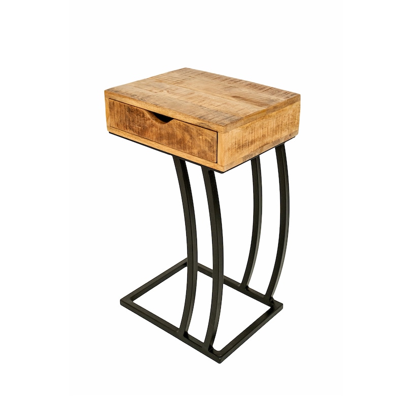 May include: A small side table with a natural wood top and a single drawer. The table has a black metal base with curved legs and a rectangular base. The wood has a warm, light brown colour. The table is approximately 60 cm high.