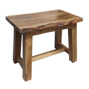 Wooden stool made of acacia wood with natural wood edge