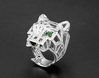 Anello leopardo di alta qualità in metallo placcato argento rodiato con occhi di cristallo verde - stile art deco.