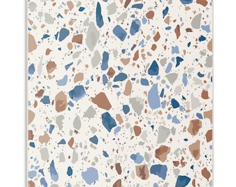 May include: A square tile featuring a terrazzo pattern with an off-white base color. The surface is covered in scattered, irregular stone-like fragments in shades of dark blue, light blue, terracotta brown, and light gray throughout the design.