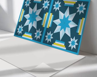 May include: A rectangular wall art piece featuring a dark blue background with a repeating geometric pattern of large and small white and light blue stars, accented by horizontal stripes in yellow, white, and light blue colors.