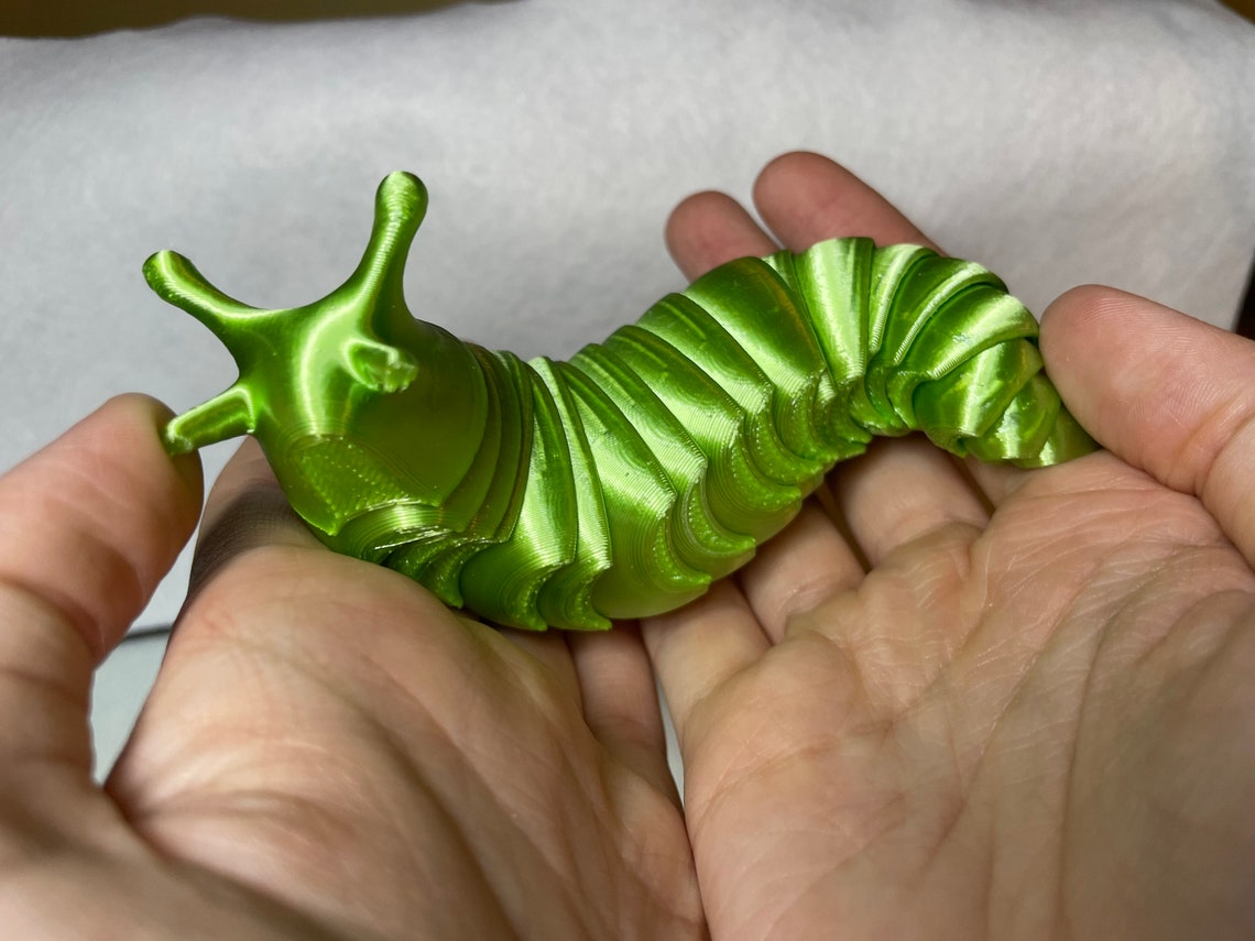 articulated slug fidget toy