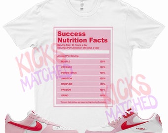crimson pink nike shirt
