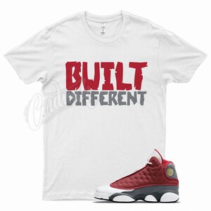 White &quot; BUILT DIFFERENT &quot; T Shirt to match Jordan 13 Gym Red Flint Grey by Kicks Matched