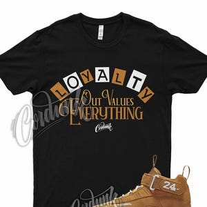 black and wheat nike shirt