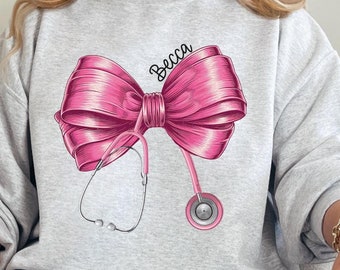Coquette Nurse Sweatshirt, Pink Bow Nurse Sweatshirt, Girl Nurse Sweater,Softcore Nurse Graduation, Girly Nurse Birthday Gift, New Nurse Tee