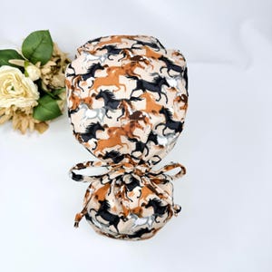 Horse Ponytail scrub cap women. Western Satin Lined Option Surgical cap with ponytail by Paradise Caps.