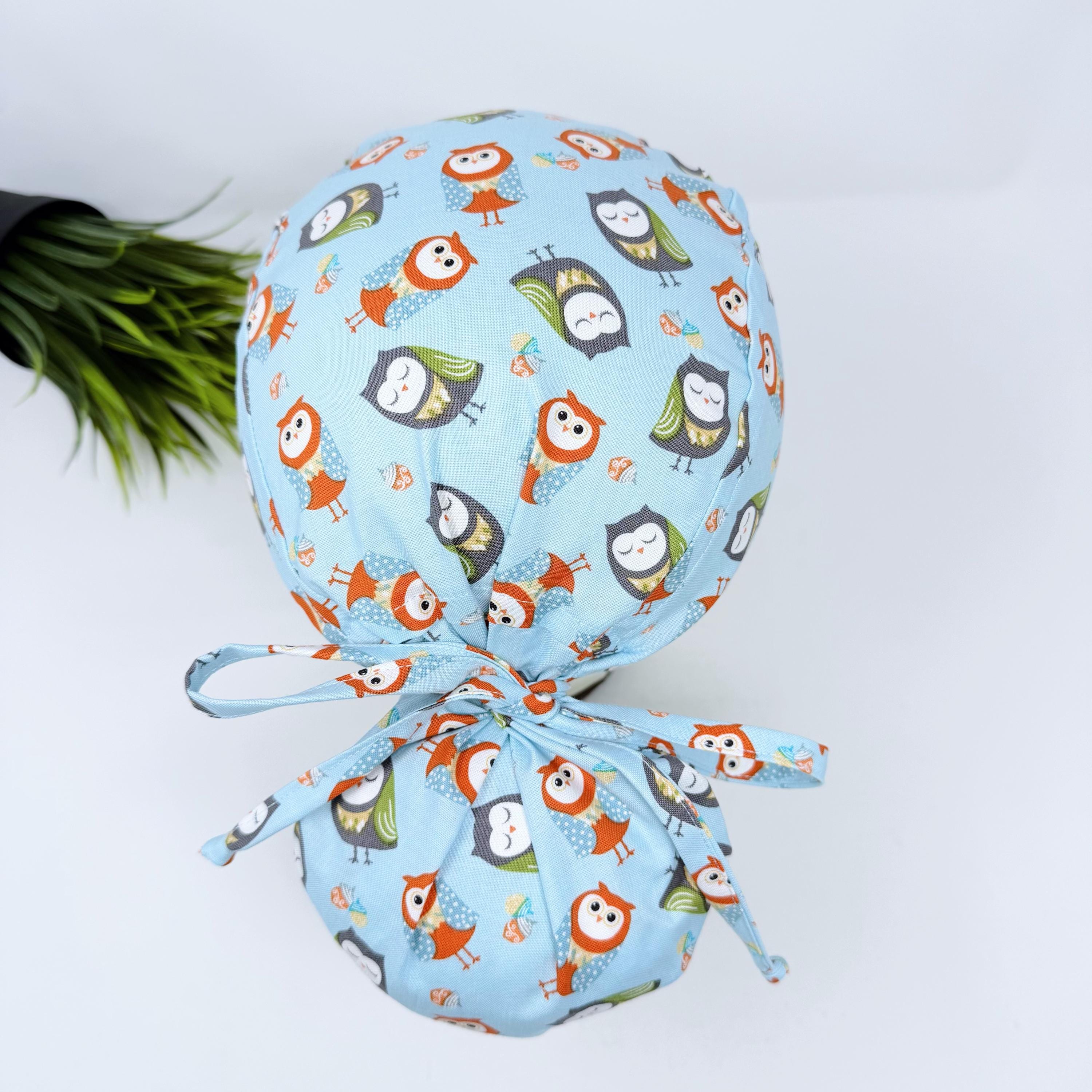 Owl Ponytail scrub cap for women with satin lined option by Paradise Caps.