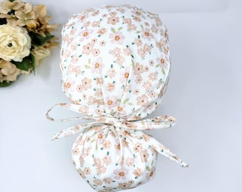 Flower Ponytail scrub cap for women. Summer Scrub hat for women with satin lined option by Paradise Caps.
