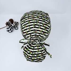 Christmas Ponytail scrub cap for women. Holly scrub cap with Satin Lined. Winter scrub hats for women by Paradise Caps.