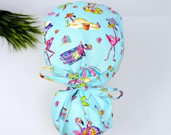 Flamingo Ponytail scrub cap by ParadiseCaps. Beach Surgical cap for women with satin lined option. Funny scrub hats for women.