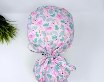 Ponytail scrub cap for women by Paradise Caps. Flamingo Surgical cap with satin lined option.