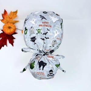 Spooky Night ponytail scrub cap, Halloween Surgical hat for women. Satin Lined Option Surgical cap by Paradise Caps.