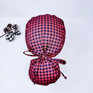 Christmas Plaid Ponytail scrub cap with Satin Lined. Winter scrub hats for women by Paradise Caps.