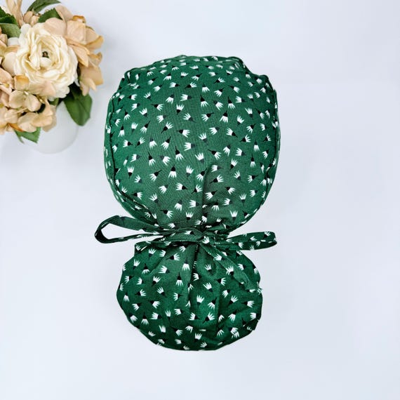 Dark Green Ponytail scrub cap by Paradise Caps. Satin lined option Surgical cap with ponytail.  Floral scrub hat for women. FREEFALL