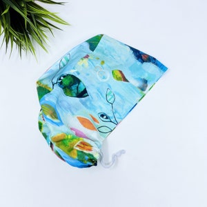 Multi Color Euro scrub cap for women. Floral European satin lined surgical cap by Paradise Caps. Solace Multi Color Circle- print