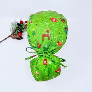 Christmas Ponytail scrub cap with Satin Lined. Reindeer surgical scrub hats for women by Paradise Caps. Winter surgical scrub caps. Green