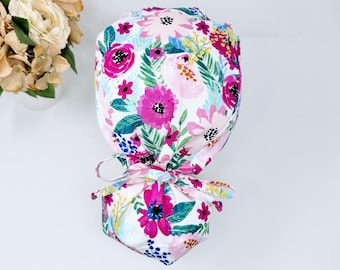 Floral ponytail scrub cap for women, Satin Lined option, scrub cap with ponytail holder by Paradise Caps. Pink flowers ponytail hat.