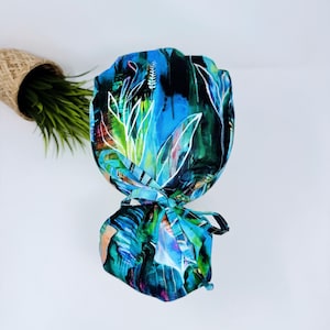 Abstract Surgical cap women. Satin Lined option, scrub cap with ponytail. Floral Blue Ponytail scrub cap by Paradise Caps.