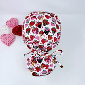 Valentine&#39;s day Ponytail scrub cap with satin lined. Strawberry surgical hat for women by Paradise Caps.