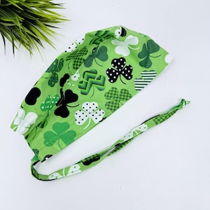 St. Patrick’s Day surgical cap. Shamrock Skull tie-back style scrub hat with satin lined option by Paradise Caps.