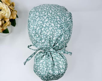 Plant Ponytail scrub cap for women. Floral scrub hat for women with satin lined option by Paradise Caps. Mint.