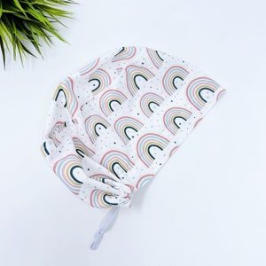 Rainbow Euro scrub cap for women by ParadiseCaps. White surgical hat with Satin Lined. Cute Rainbows and Dots - print.