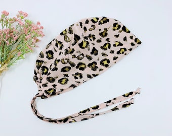 Leopard Skull tie-back style scrub cap. Pink surgical cap for women by Paradise Caps.