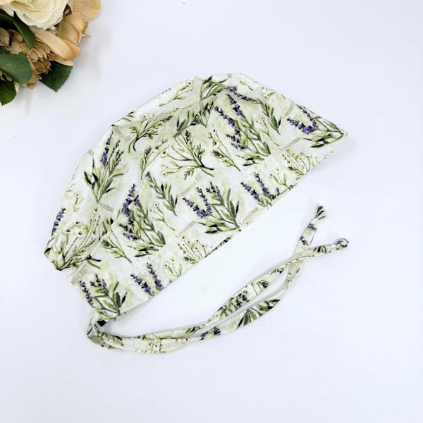 Lavender scrub cap. Skull tie-back style surgical scrub cap by Paradise Caps. Ivory.